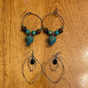 Set of 2 costume jewellery dangling hoop style earrings on shepherd hooks.